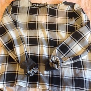 Plaid light weight, see through shirt.